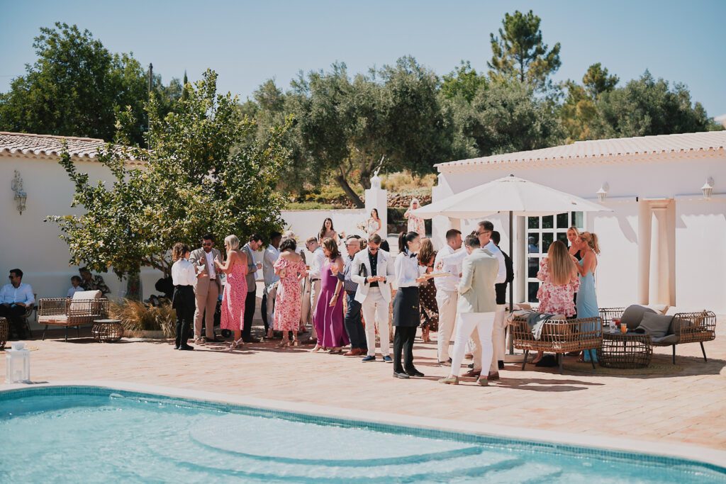 Wedding guests having drinks