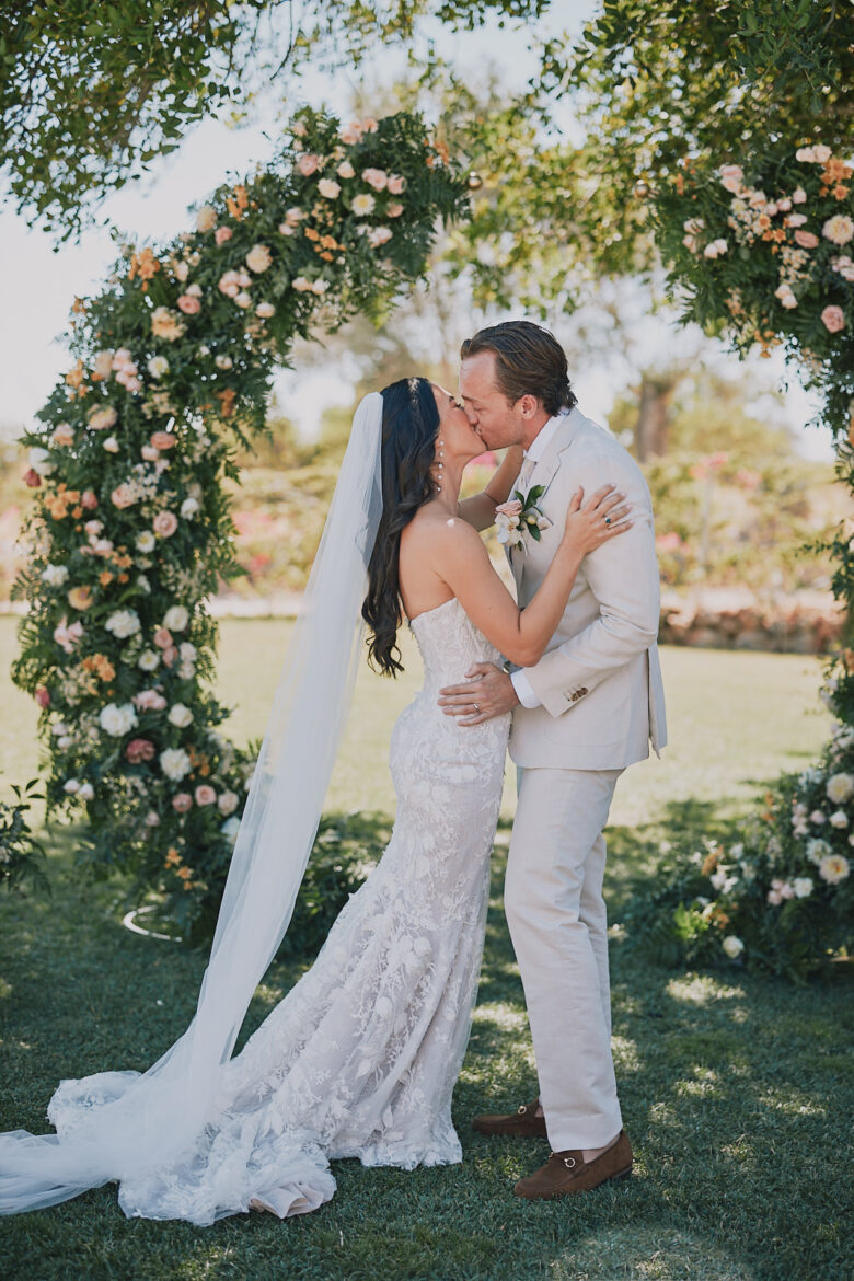 Bride and groom kissing