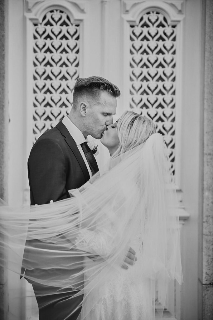 Bride and groom kissing