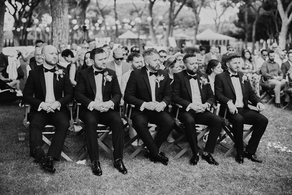 Groomsmen sitting