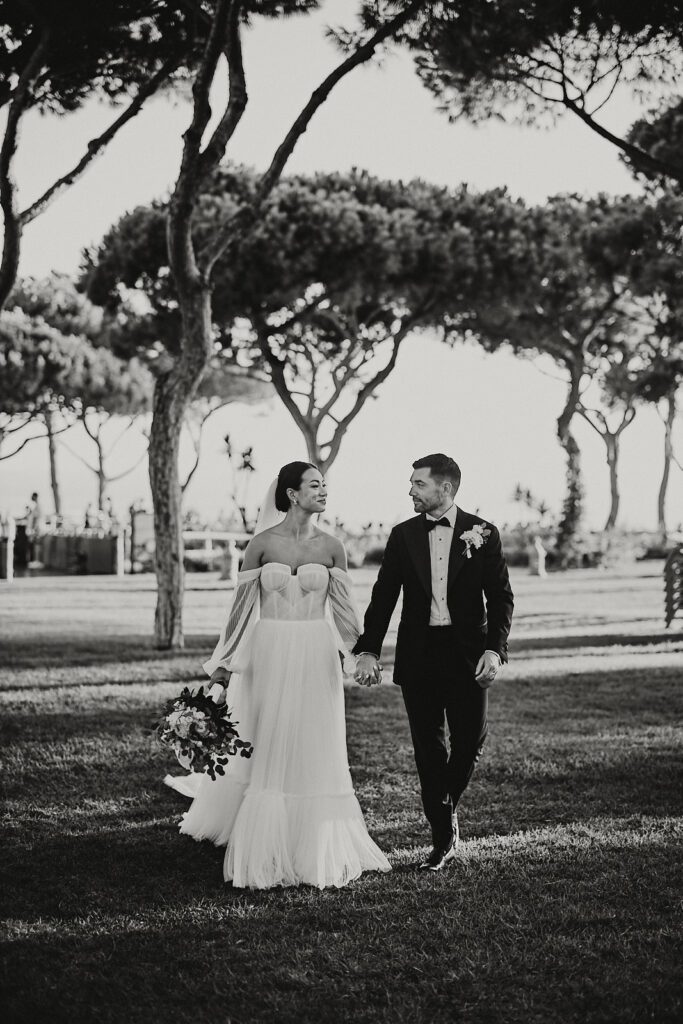 Bride and groom walking hand in hand