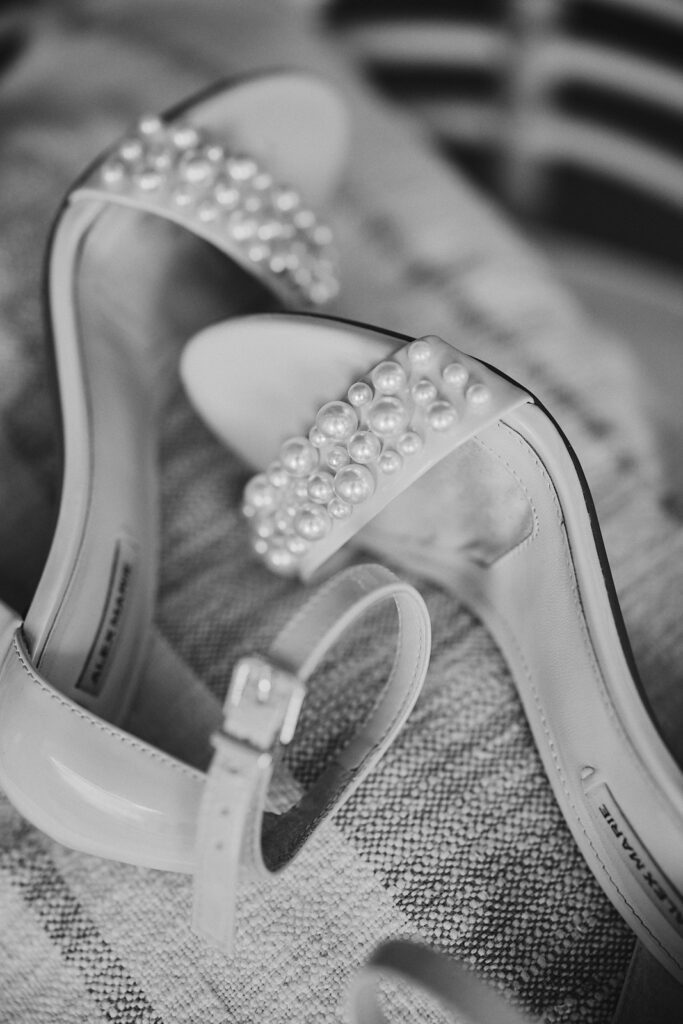 Wedding shoes photographed by Algarve wedding videographer Maria & Sandy